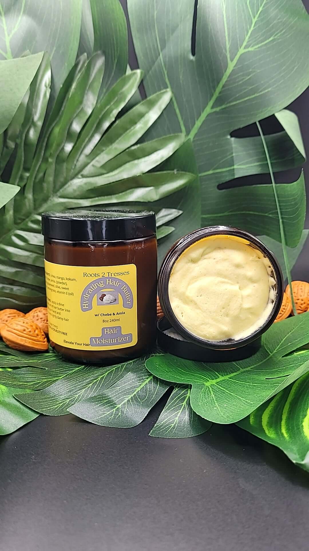 Roots 2 Tresses Hydrating Hair Butter; yellow buttery substance